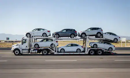 Multi-level car carrier on the highway to Incline Village, Nevada, United States