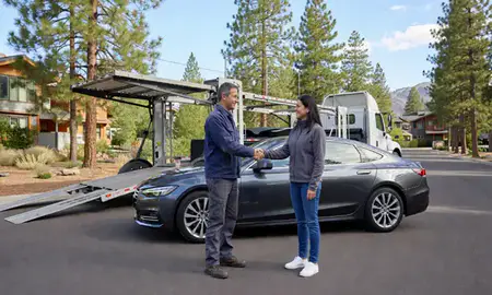 Vehicle owner beside their delivered car in Incline Village, Nevada, United States