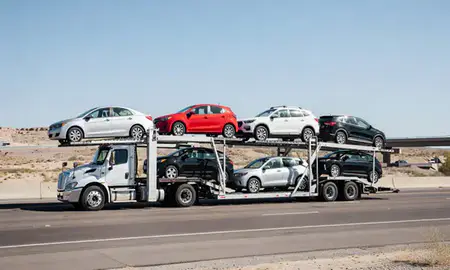 Multi-level car carrier on the highway to Mesquite, Nevada, United States