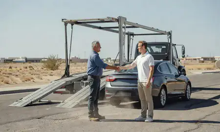 Vehicle owner beside their delivered car in Mesquite, Nevada, United States