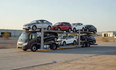 Car transporter loaded with vehicles in Moapa Valley, Nevada, United States