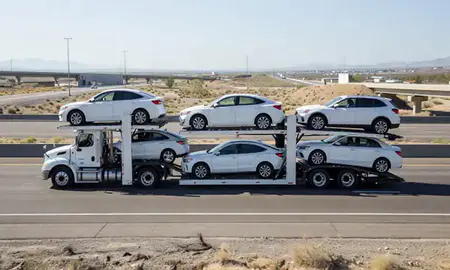 Multi-level car carrier on the highway to Reno, Nevada, United States