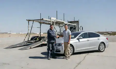 Vehicle owner beside their delivered car in Sparks, Nevada, United States