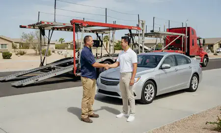 Vehicle owner beside their delivered car in Summerlin South, Nevada, United States