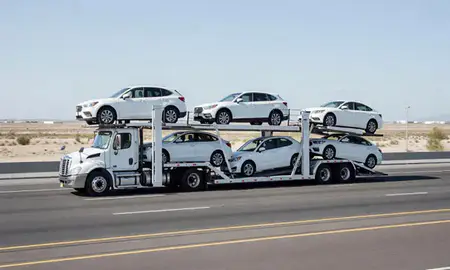 Multi-level car carrier on the highway to Sunrise Manor, Nevada, United States