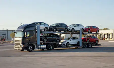 Car transporter loaded with vehicles in Whitney, Nevada, United States