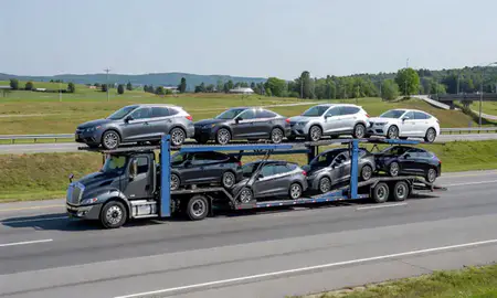 Multi-level car carrier on the highway to East Merrimack, New Hampshire, United States
