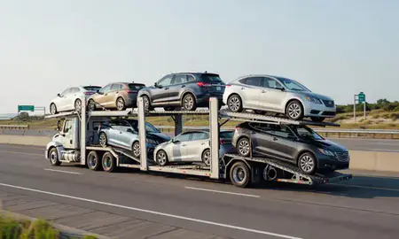 Multi-level car carrier on the highway to Hampton Beach, New Hampshire, United States