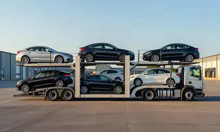 Car transporter parked in an industrial area of Nashua, New Hampshire, United States