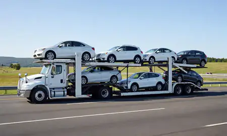 Multi-level car carrier on the highway to North Haverhill, New Hampshire, United States
