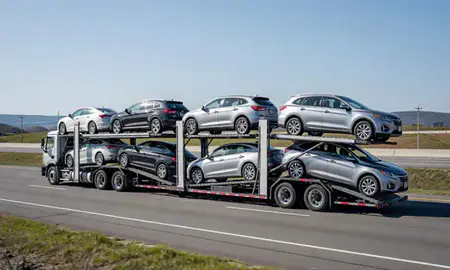 Multi-level car carrier on the highway to Pinardville, New Hampshire, United States