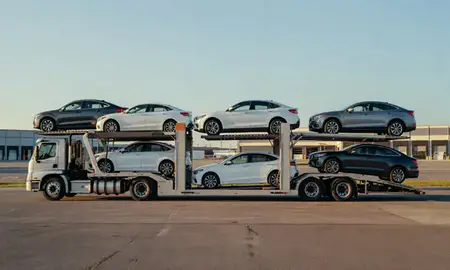 Car transporter parked in an industrial area of Rochester, New Hampshire, United States