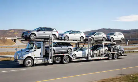 Multi-level car carrier on the highway to South Hooksett, New Hampshire, United States