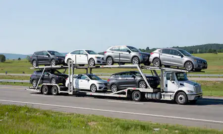 Multi-level car carrier on the highway to West Swanzey, New Hampshire, United States