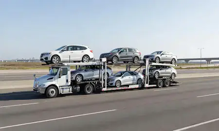 Multi-level car carrier on the highway to Atlantic City, New Jersey, United States