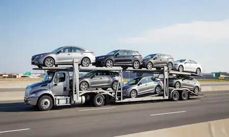 Multi-level car carrier on the highway to Elizabeth, New Jersey, United States