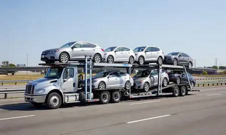 Multi-level car carrier on the highway to Hoboken, New Jersey, United States