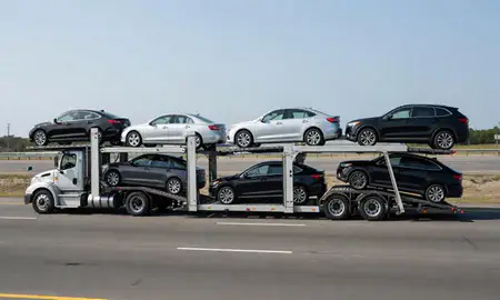 Multi-level car carrier on the highway to Long Branch, New Jersey, United States