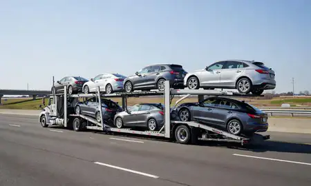 Multi-level car carrier on the highway to Paterson, New Jersey, United States
