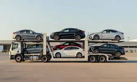 Car transporter parked in an industrial area of West New York, New Jersey, United States
