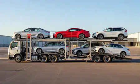 Car transporter parked in an industrial area of New Mexico, United States
