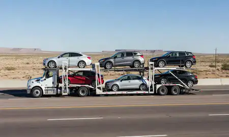 Multi-level car carrier on the highway to Alamogordo, New Mexico, United States