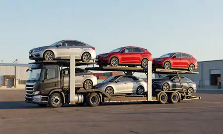 Car transporter loaded with vehicles in Artesia, New Mexico, United States