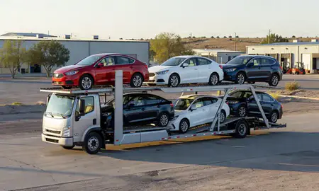 Car transporter loaded with vehicles in Bernalillo, New Mexico, United States