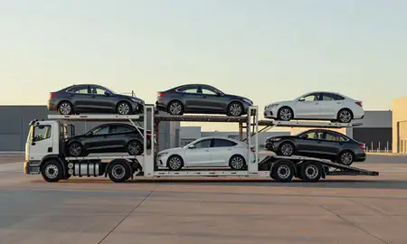 Car transporter parked in an industrial area of Carlsbad, New Mexico, United States