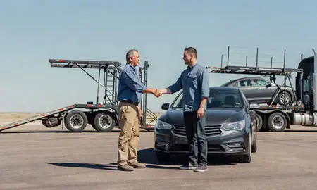 Vehicle owner beside their delivered car in Clovis, New Mexico, United States