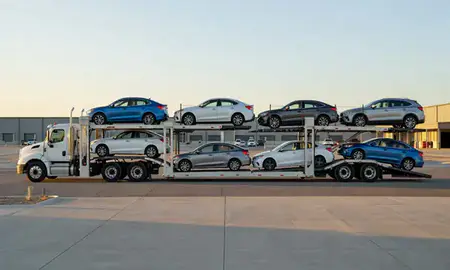 Car transporter parked in an industrial area of Corrales, New Mexico, United States