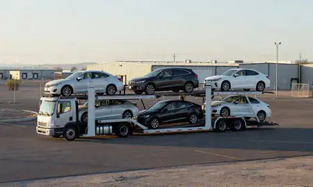 Car transporter loaded with vehicles in Deming, New Mexico, United States
