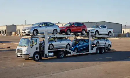 Car transporter loaded with vehicles in Las Vegas, New Mexico, United States