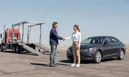 Vehicle owner beside their delivered car in Los Alamos, New Mexico, United States