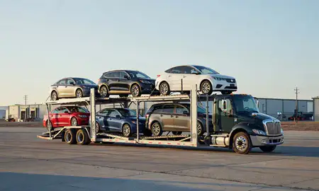 Car transporter loaded with vehicles in Silver City, New Mexico, United States