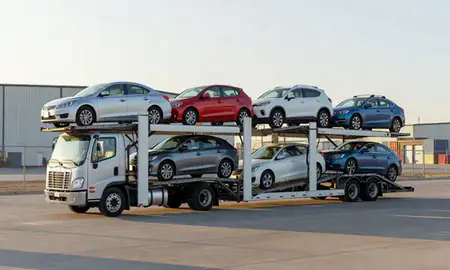 Car transporter loaded with vehicles in Socorro, New Mexico, United States