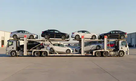 Car transporter parked in an industrial area of Sunland Park, New Mexico, United States