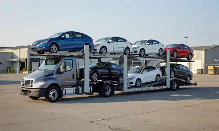 Car transporter loaded with vehicles in Poughkeepsie, New York, United States