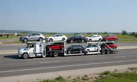 Multi-level car carrier on the highway to Saratoga Springs, New York, United States