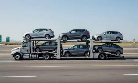 Multi-level car carrier on the highway to Staten Island, New York, United States