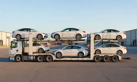 Car transporter parked in an industrial area of Troy, New York, United States