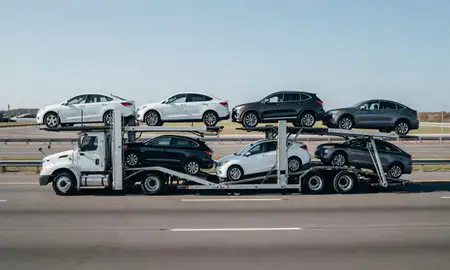 Multi-level car carrier on the highway to West Babylon, New York, United States