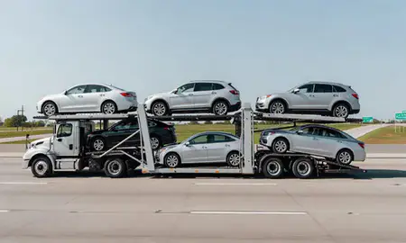 Multi-level car carrier on the highway to White Plains, New York, United States