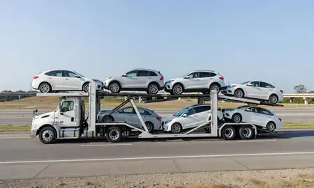 Multi-level car carrier on the highway to North Carolina, United States