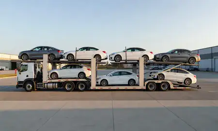 Car transporter parked in an industrial area of Asheville, North Carolina, United States