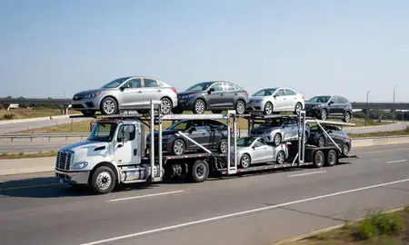 Multi-level car carrier on the highway to Concord, North Carolina, United States