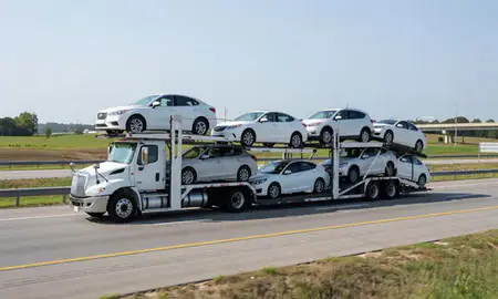 Multi-level car carrier on the highway to Goldsboro, North Carolina, United States