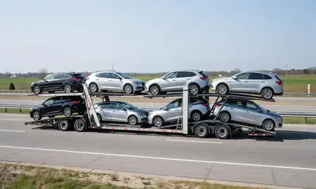 Multi-level car carrier on the highway to Greenville, North Carolina, United States
