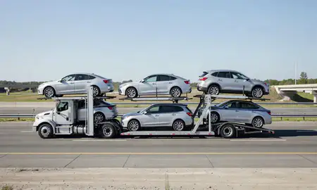 Multi-level car carrier on the highway to Holly Springs, North Carolina, United States