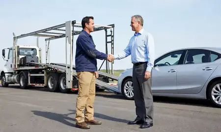 Vehicle owner beside their delivered car in Indian Trail, North Carolina, United States